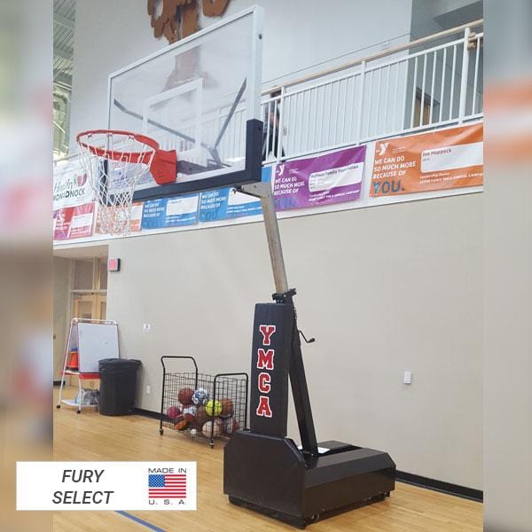 sample of portable basketball goal with clear acrylic backboard  and black base safety padding with print &quot;YMCA&quot;