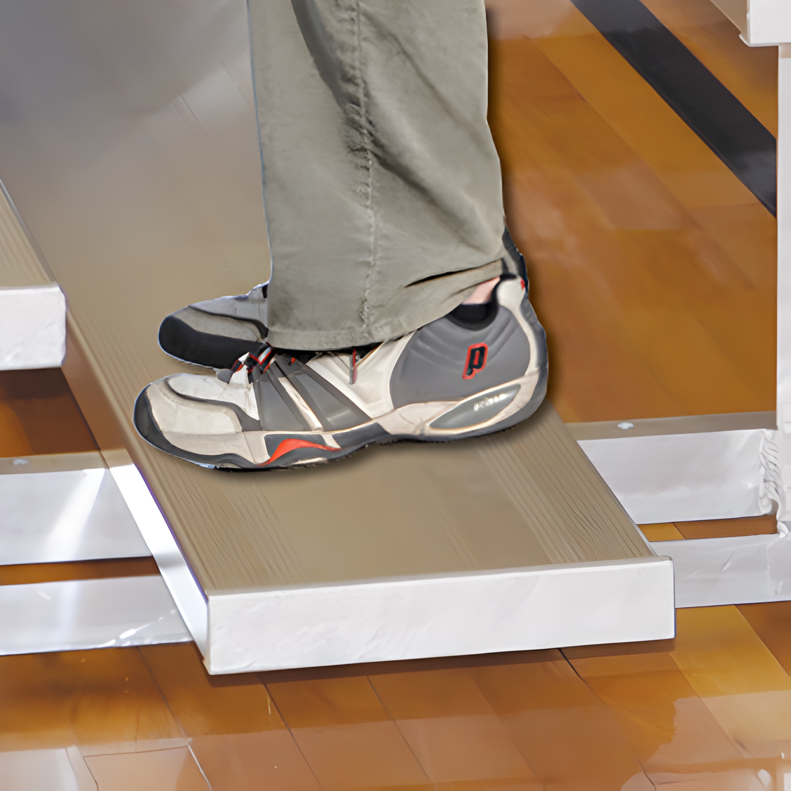 Isometric view of indoor bleacher seats with metal frame structure.